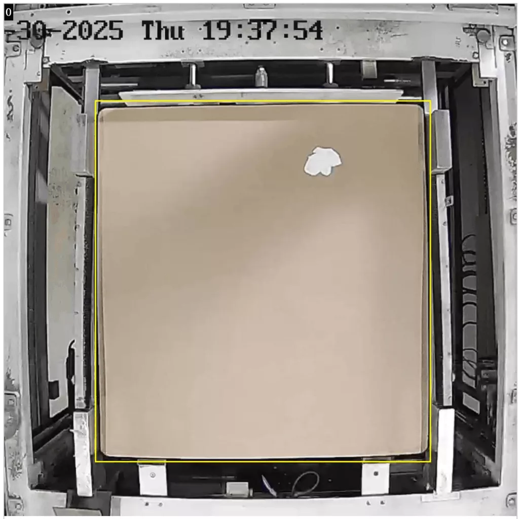 Large debris and foreign objects on the surface of packaging cardboard before stacking aluminium cans — a defect detected by computer vision in quality control