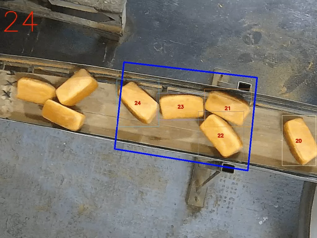 Overlapping bread loaves causing counting challenges on conveyor