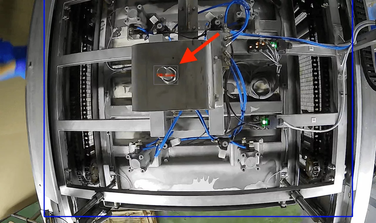 AI vision system false positive: identifying magnetic plate bolts as cans.
