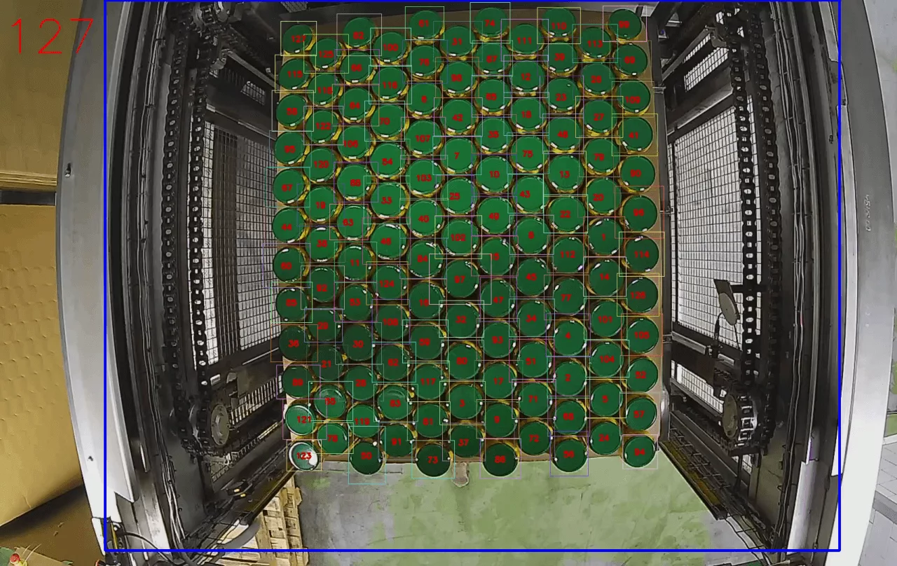 Industrial interface of CamContador showing real-time can counting on a pallet