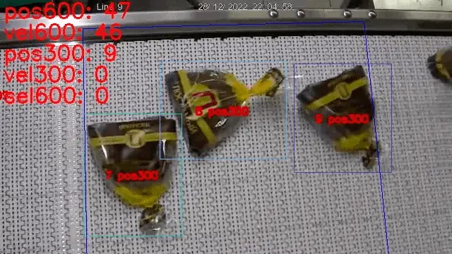 Packaged bread SKUs on conveyor belt — automated counting by product type