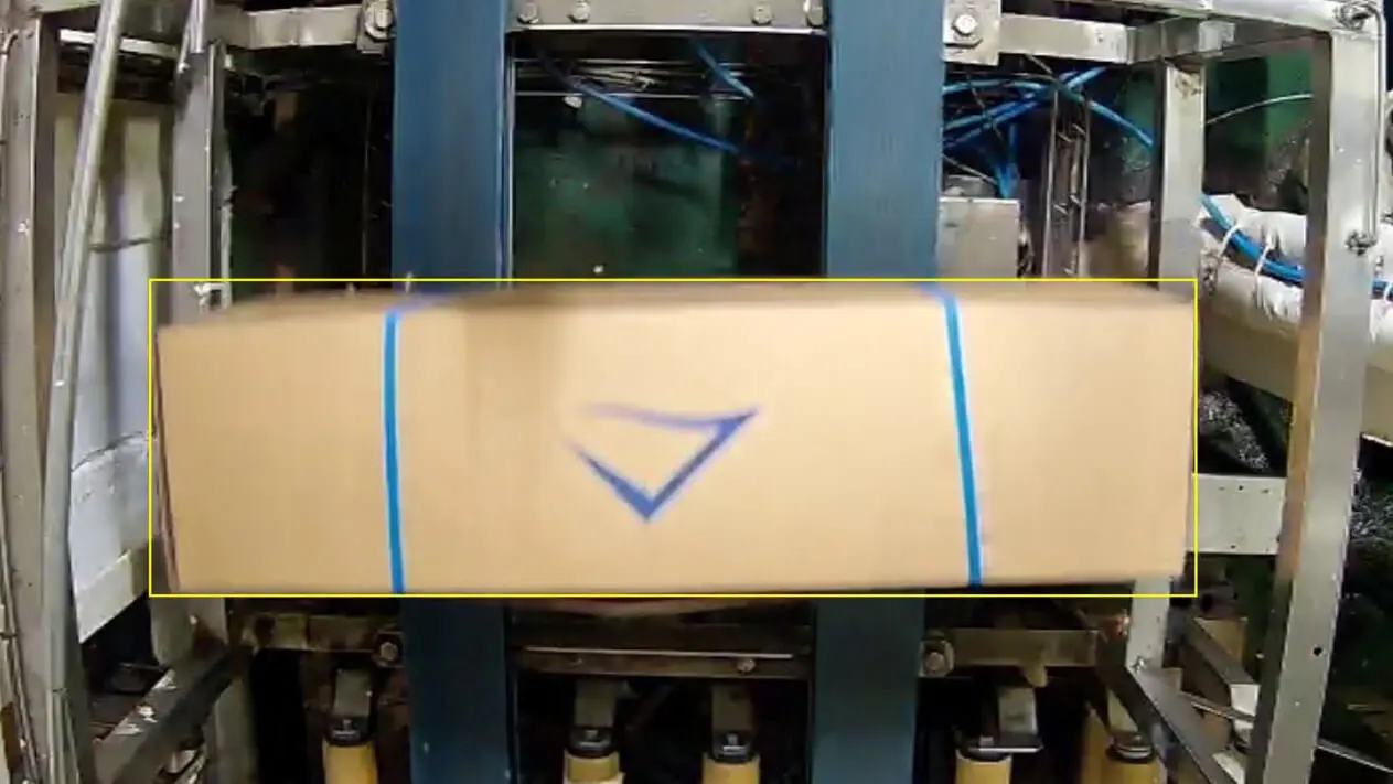 Computer vision system counting boxes of frozen fish on a trawler conveyor line at sea